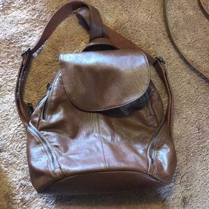 Never used soft faux leather brown purse backpack